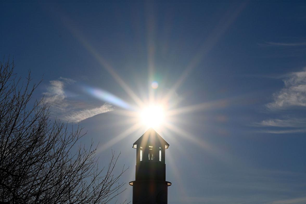 Leuchtturm mit Sonnenstern